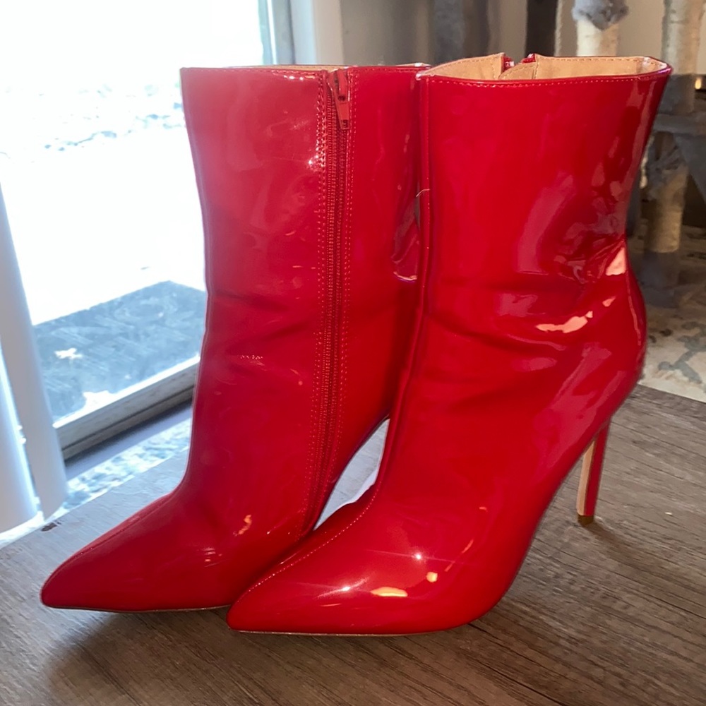 Size 8.5 red leather heeled boots